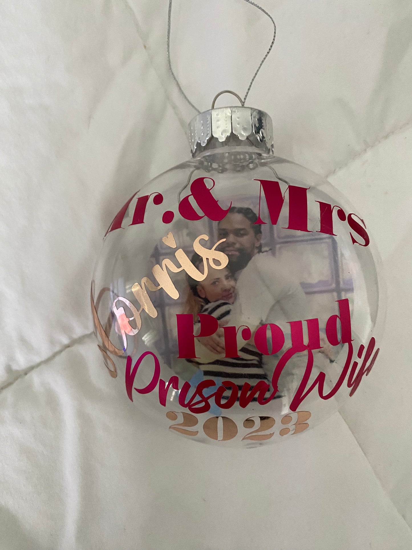 Proud prison wife floating ornaments. Customizable to add Mr.and Mrs. With last name, , special saying , favorite phrase, and year or date. Different colored lettering available.